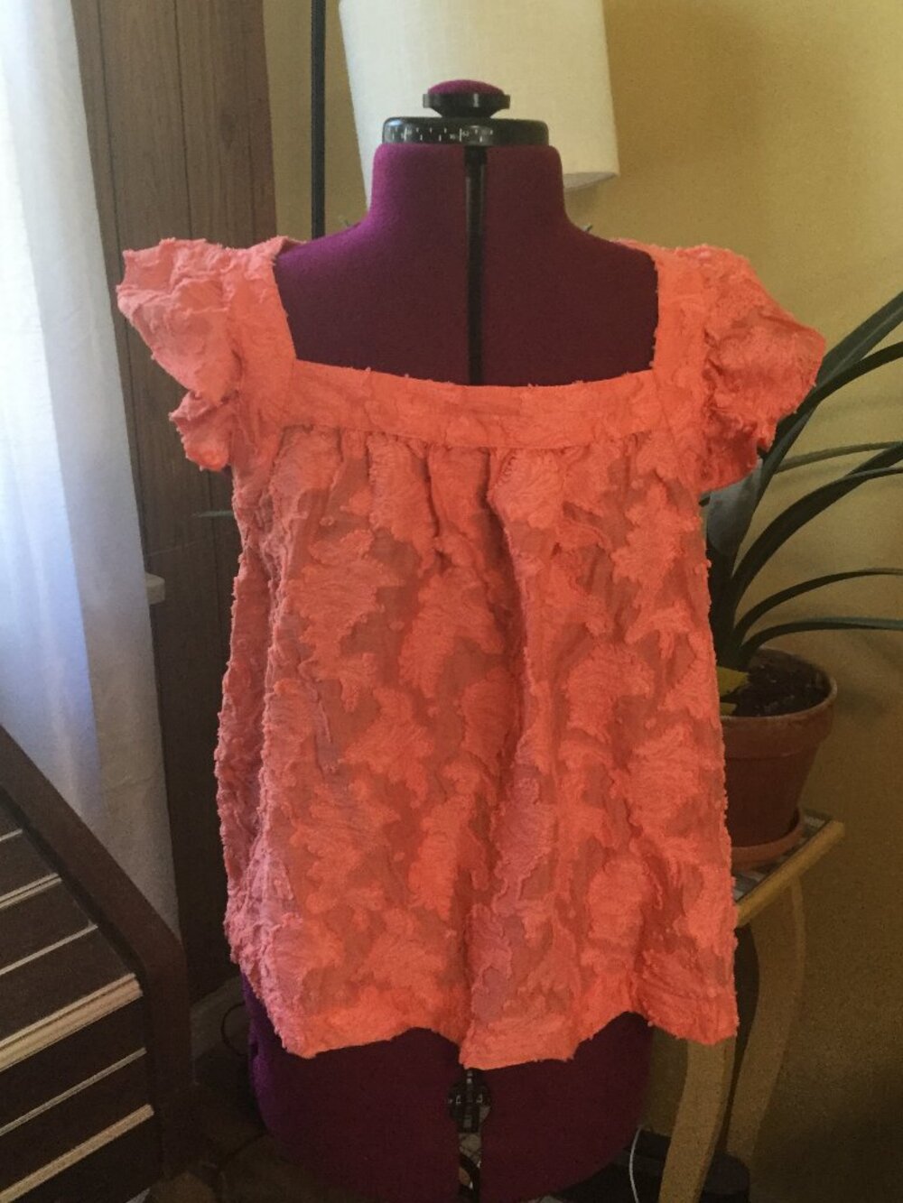 By Anthropology coral colored ruffled sleeve top textured fabric size medium